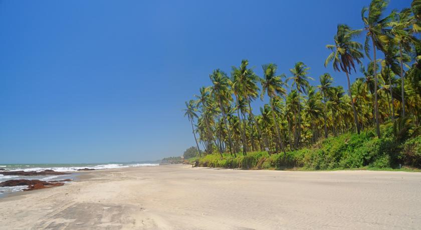 Tiara Fiesta Beach Cottages Morjim Exterior photo