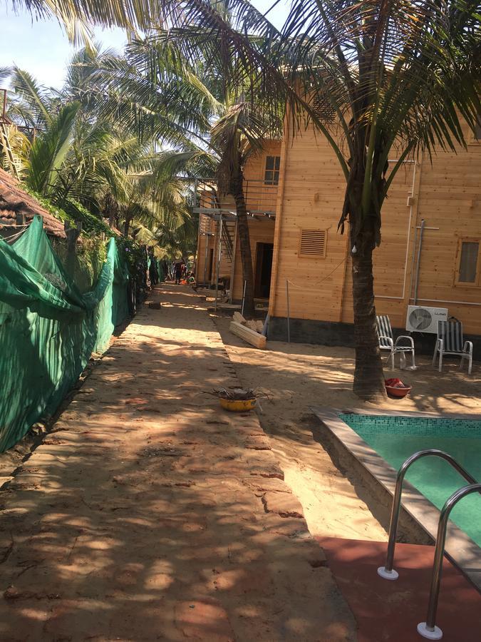 Tiara Fiesta Beach Cottages Morjim Exterior photo